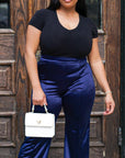 Model is wearing Bottoms Navy Satin Stretchy Highwasted pants She's Elegant