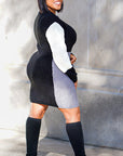 Model is wearing Color Block Knit Sweater Dress She's Elegant