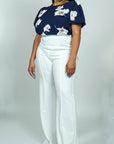 Model is wearing High Waisted Dress Pants - White She's Elegant