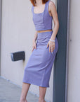 Model is wearing Lavender Pointe High Waisted Pencil Midi Skirt And Corset Square Neckline Top Set Lavender Pointe High Waisted Pencil Midi Skirt And Corset Square Neckline Top 2 piece Set She's Elegant