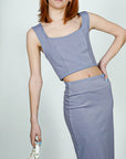 Model is wearing Lavender Pointe High Waisted Pencil Midi Skirt And Corset Square Neckline Top Set She's Elegant