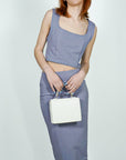 Model is wearing Lavender Pointe High Waisted Pencil Midi Skirt And Corset Square Neckline Top Set She's Elegant