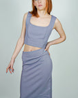 Model is wearing Lavender Pointe High Waisted Pencil Midi Skirt And Corset Square Neckline Top Set She's Elegant