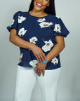 Model is wearing Navy Floral Printed Top with Puff sleeves She's Elegant