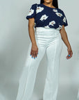 Model is wearing Navy Floral Printed Top with Puff sleeves She's Elegant
