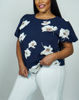 Model is wearing Navy Floral Printed Top with Puff sleeves She's Elegant