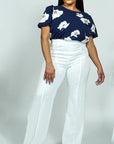 Model is wearing Navy Floral Printed Top with Puff sleeves She's Elegant
