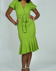 Model is wearing Puff Sleeve Belted Mermaid ruffle Midi Dress She's Elegant
