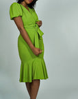 Model is wearing Puff Sleeve Belted Mermaid ruffle Midi Dress She's Elegant