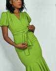 Model is wearing Puff Sleeve Belted Mermaid ruffle Midi Dress She's Elegant