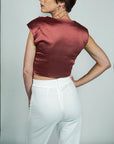 Model is wearing Rose pink Satin Sleeveless Cowl Top with shoulder pads She's Elegant
