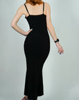 Model is wearing Ruffle Front Wrap and Hem Maxi Dress She's Elegant
