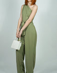Model is wearing Sage One Shoulder Jumpsuit With Selftie Belt She's Elegant
