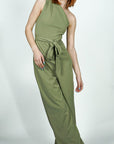 Model is wearing Sage One Shoulder Jumpsuit With Selftie Belt She's Elegant
