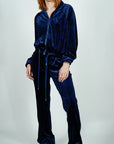 Model is wearing Velvet Flared Track Suit Jacket/Pants Set Navy Blue Velvet Flared Track Suit Jacket/Pants Set She's Elegant