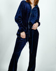 Model is wearing Velvet Flared Track Suit Jacket/Pants Set Navy Blue Velvet Flared Track Suit Jacket/Pants Set She's Elegant