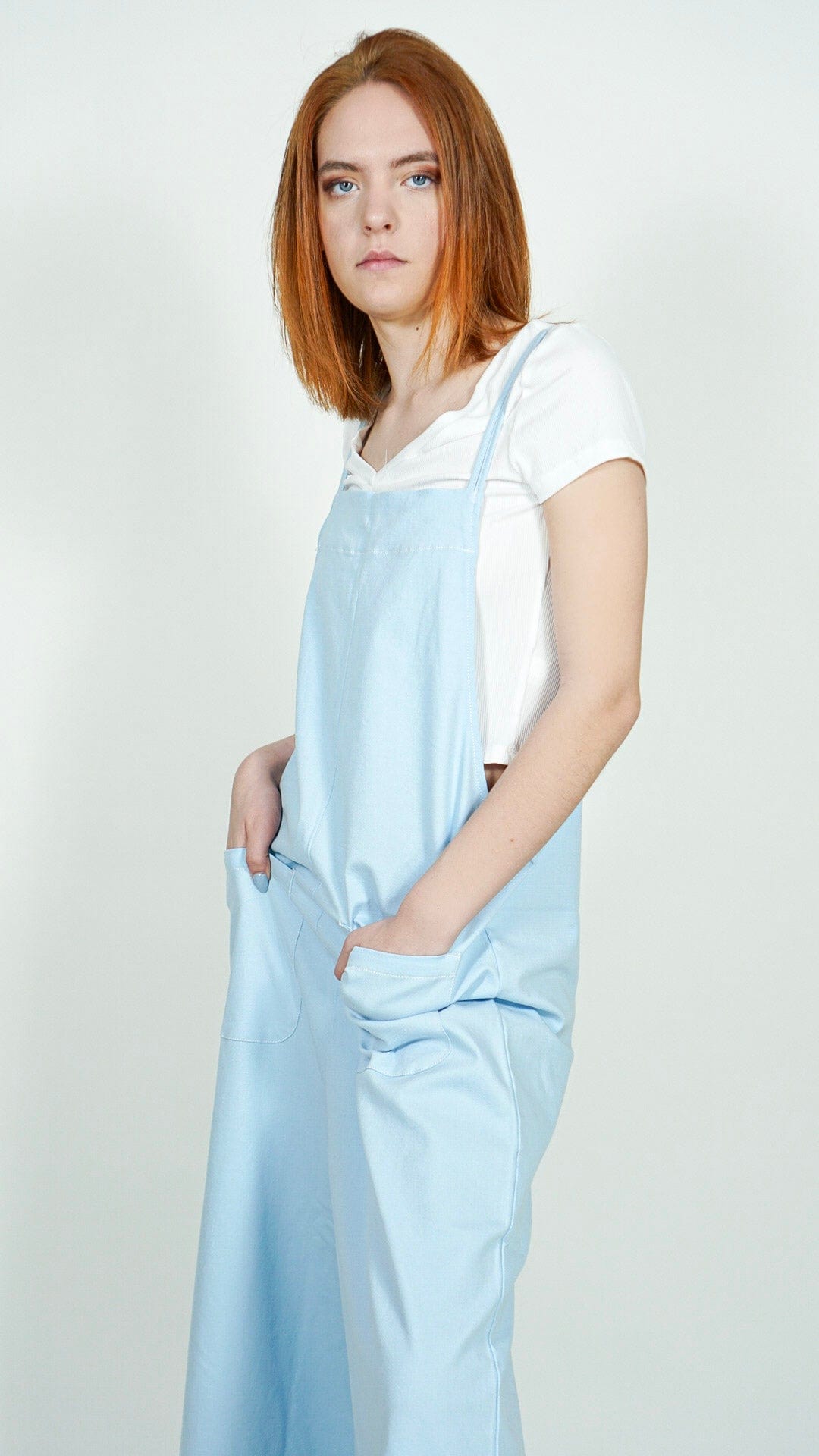 Model is wearing Baby Blue Wide Leg Jumpsuit. With Pockets She's Elegant 