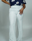 Model is wearing High Waisted Dress Pants - White She's Elegant 