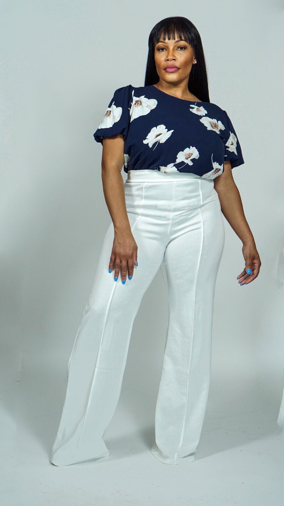 Model is wearing Navy Floral Printed Top with Puff sleeves She&#39;s Elegant 