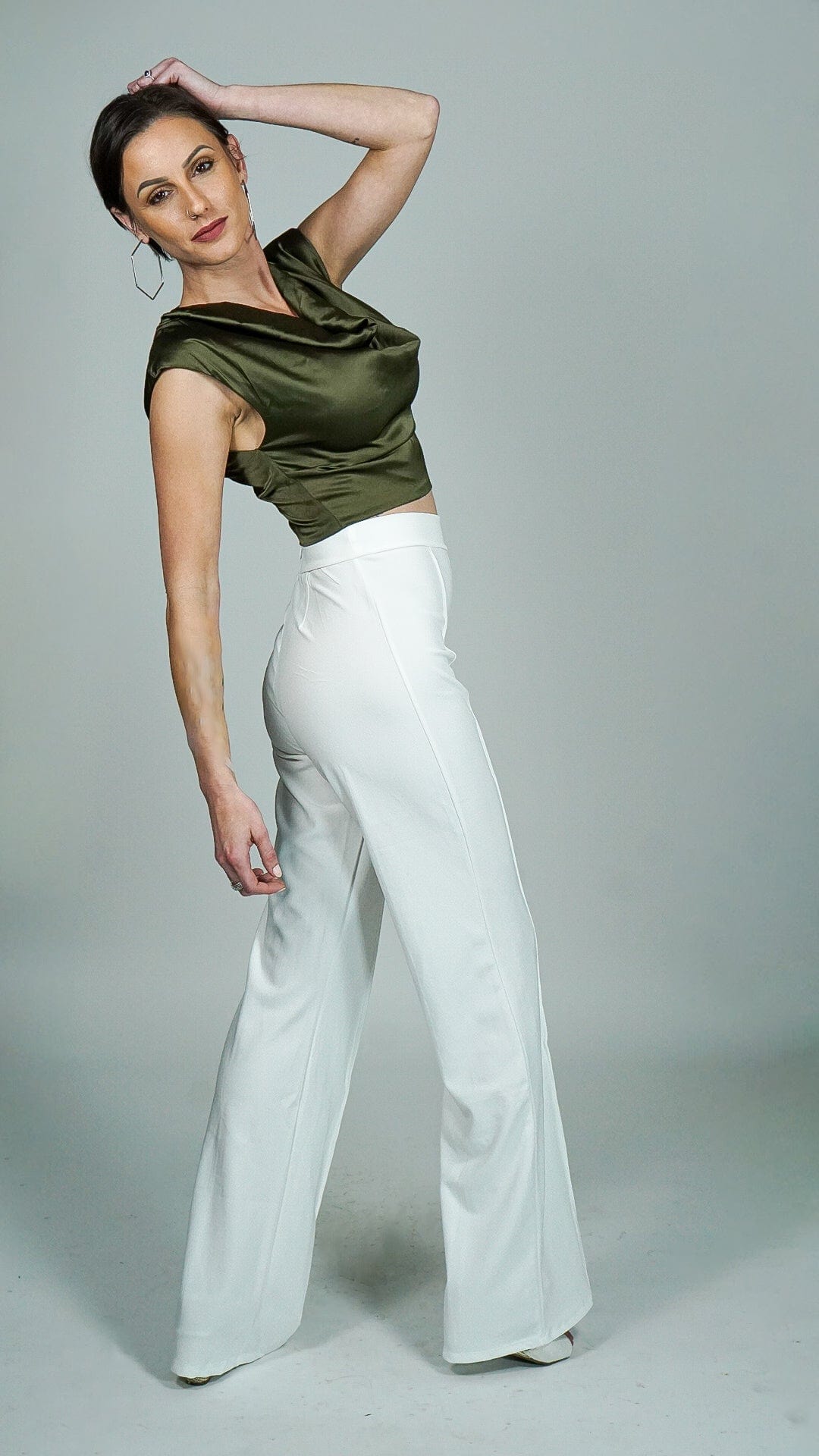Model is wearing Olive green Satin Sleeveless Cowl Top with shoulder pads She's Elegant