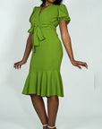 Model is wearing Puff Sleeve Belted Mermaid ruffle Midi Dress She's Elegant 