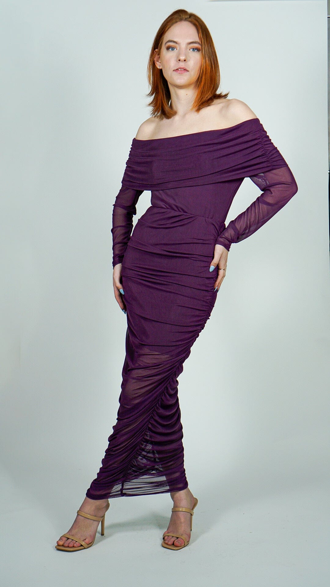 Model is wearing Purple Sheer Long Sleeve Mesh Midi Dress with sheer flowy Hem bottom She's Elegant 