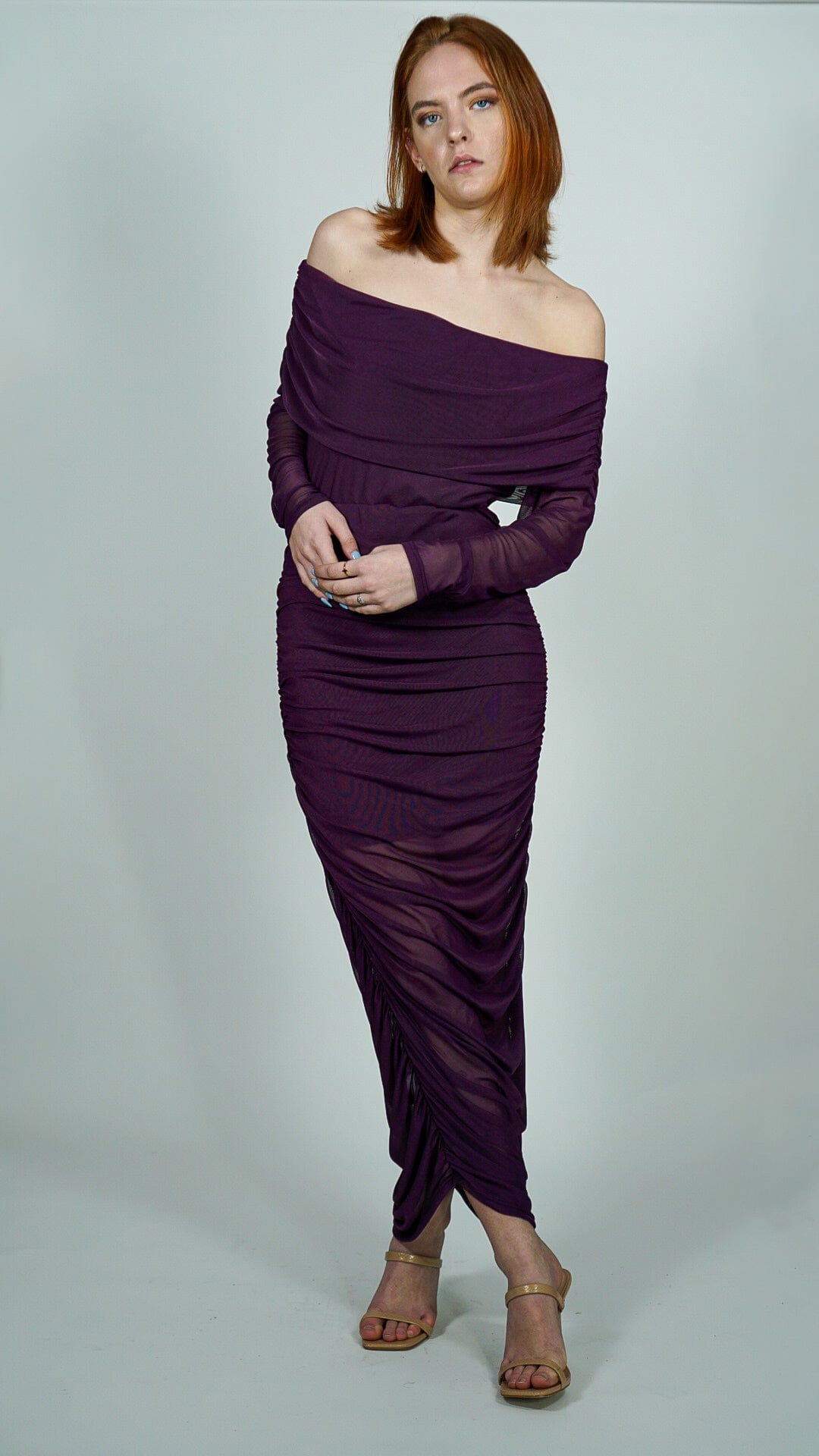 Model is wearing Purple Sheer Long Sleeve Mesh Midi Dress with sheer flowy Hem bottom She's Elegant 