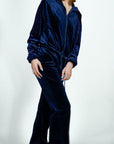 Model is wearing Velvet Flared Track Suit Jacket/Pants Set Navy Blue Velvet Flared Track Suit Jacket/Pants Set She's Elegant 